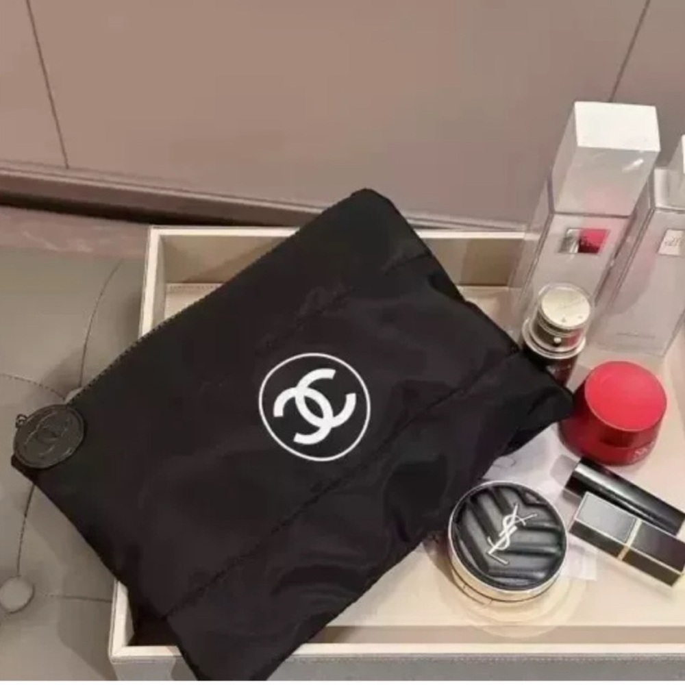 CC makeup/laptop pouch & dustbag. New